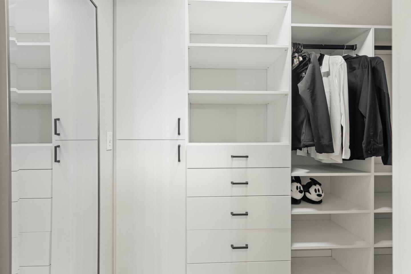 16935 Pine Way Morgan Hill, CA 95037 - Photo 38 of 50 a view of walk in closet with clothes and shoes