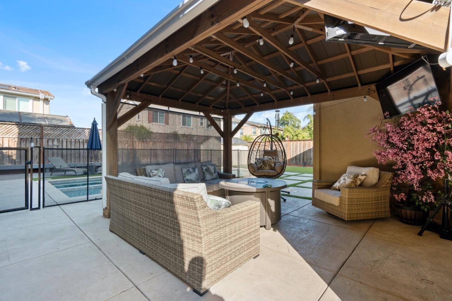 16935 Pine Way Morgan Hill, CA 95037 - Photo 40 of 50 a view of a patio with couches and potted plants