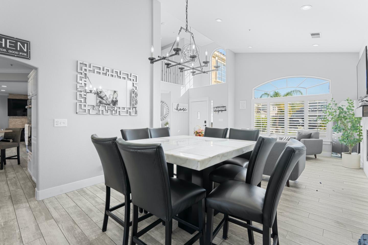 16935 Pine Way Morgan Hill, CA 95037 - Photo 10 of 50 a view of a dining room with furniture window and wooden floor