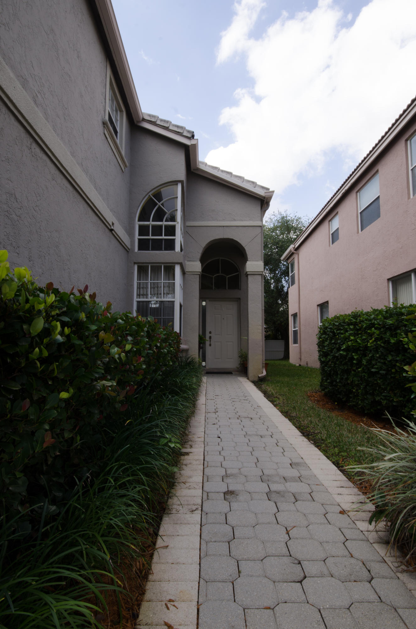 2079 Cezanne Road West Palm Beach, FL 33409 - Photo 21 of 36 FRONT WALKWAY
