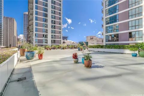 a street view with building and cars