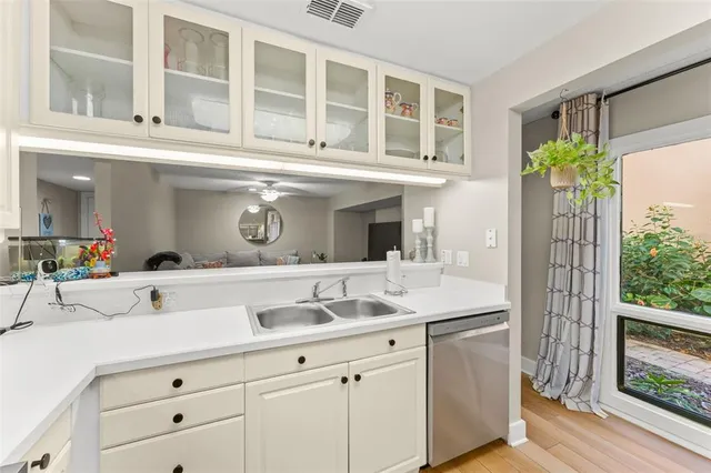 a bathroom with a sink toilet and mirror