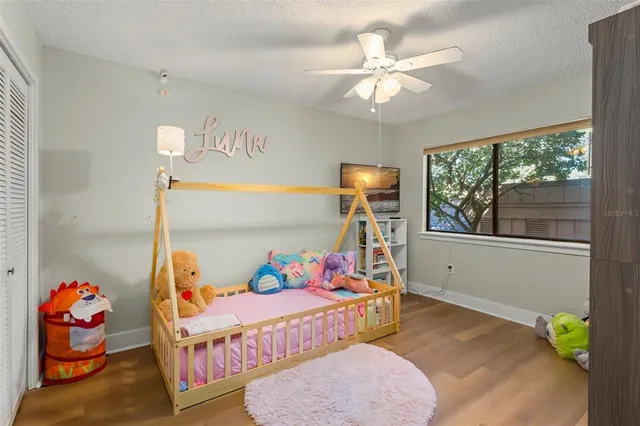 a room with furniture and a flat screen tv