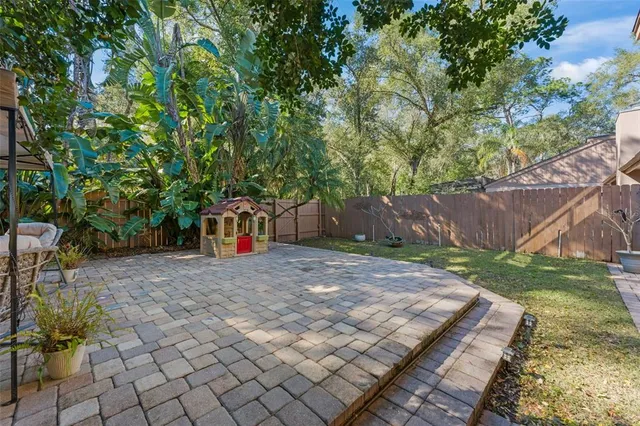 a view of a playground with basketball court
