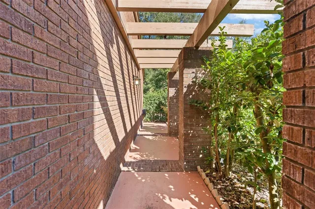 a view of a hallway with a furniture