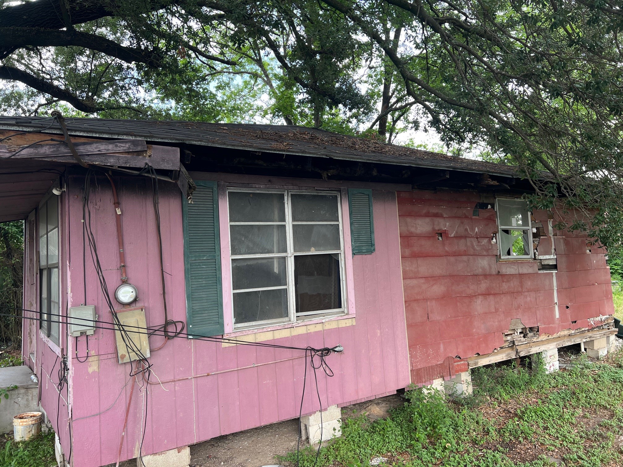 4814 Firnat Street Houston, TX 77016 - Photo 3 of 9 a small hut with trees in the background