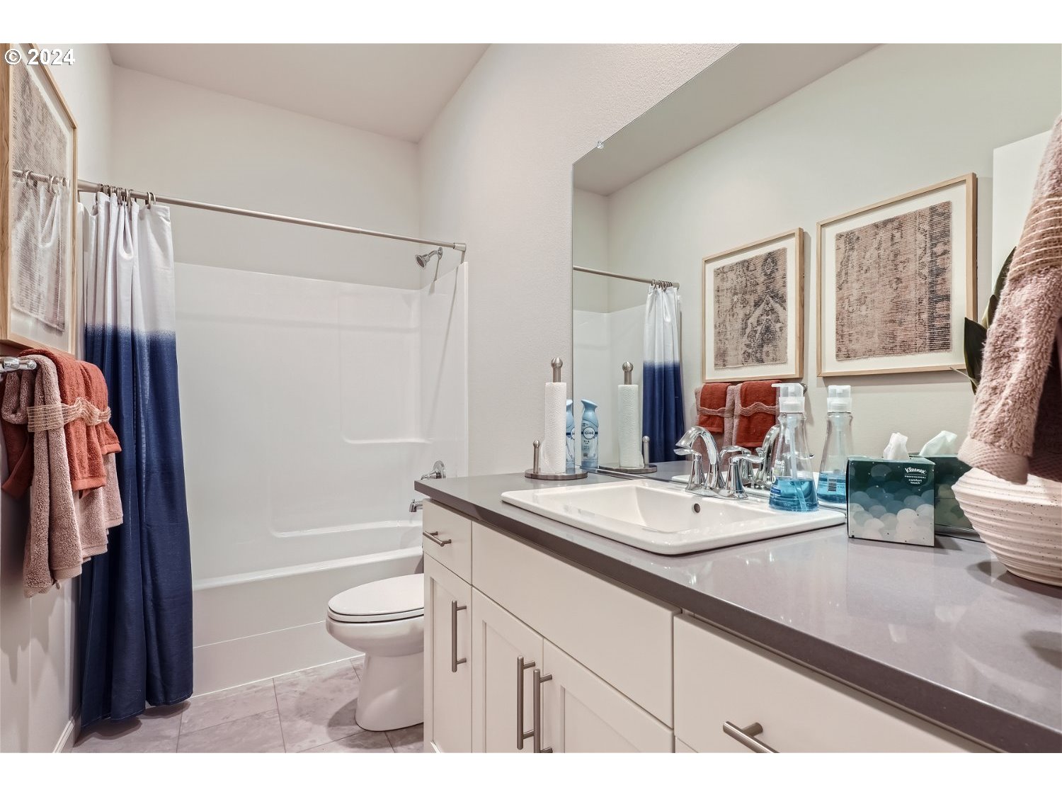 5435 North 87th Avenue Camas, WA 98607 - Photo 12 of 16 a bathroom with a sink a toilet a tub and shower