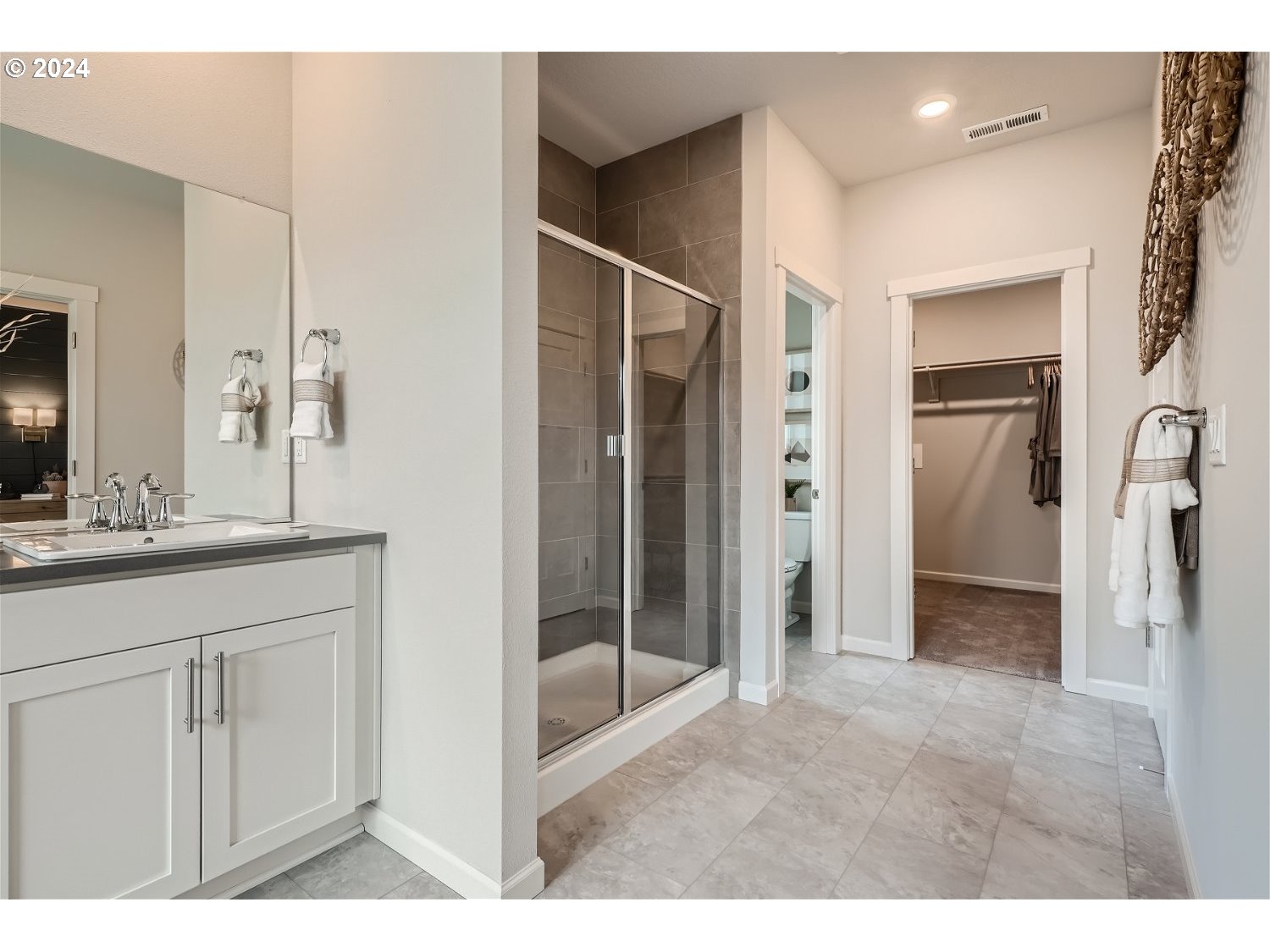 5435 North 87th Avenue Camas, WA 98607 - Photo 16 of 16 a bathroom with a sink and a mirror