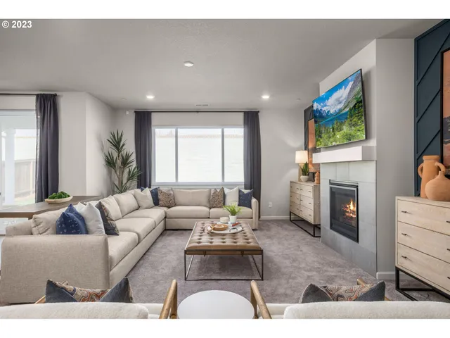 a kitchen with stainless steel appliances granite countertop counter space sink refrigerator and cabinets