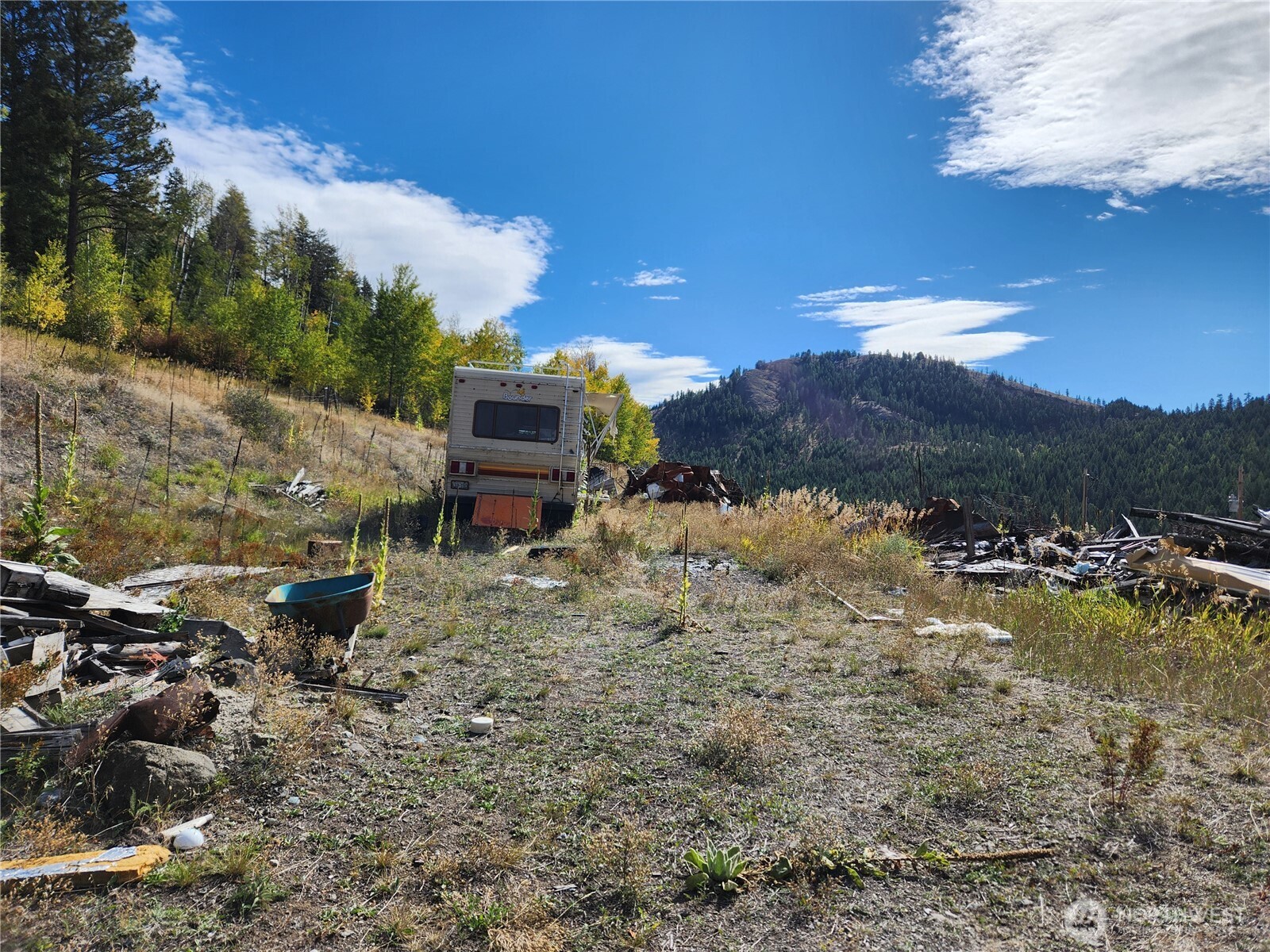 18 Robin Road Republic, WA 99166 - Photo 7 of 8 a view of a town with mountains in the background