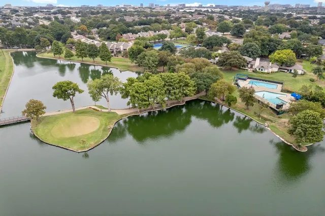 an aerial view of lake residential house with outdoor space