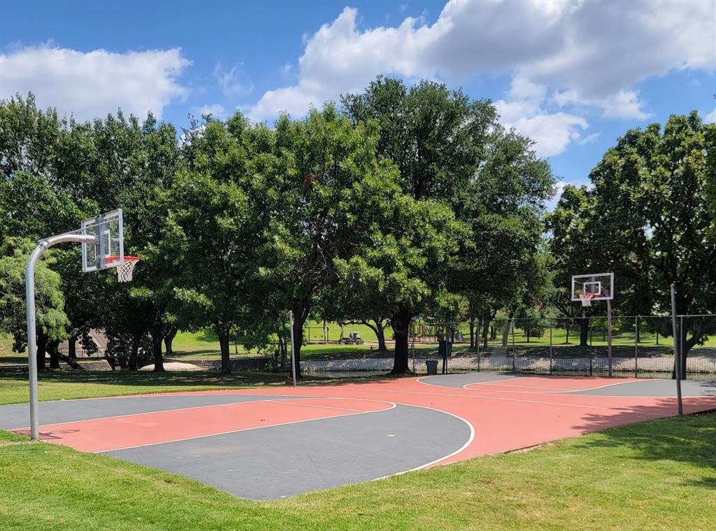 2901 Country Pl Circle Carrollton, TX 75006 - Photo 36 of 37 a view of a playground with basketball court