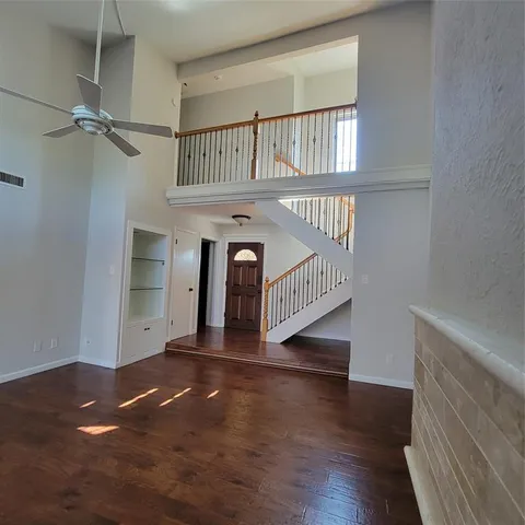 a view of an entryway with a hallway