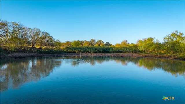 a view of an ocean and city