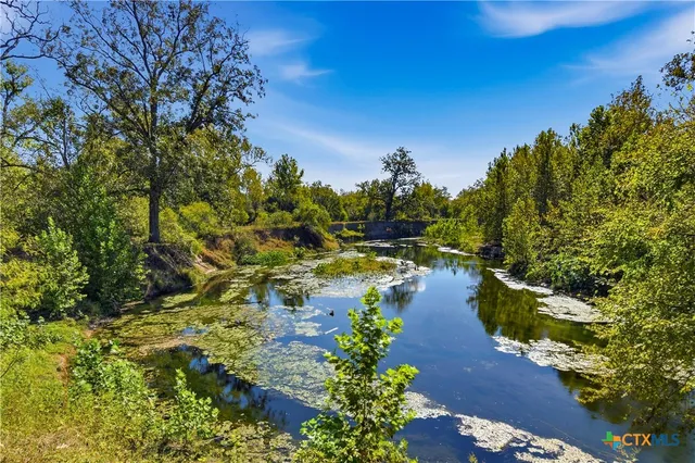a view of a lake with houses