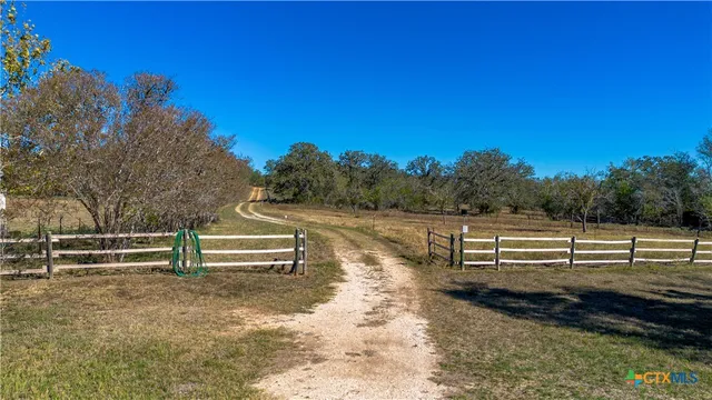 a view of park bench sitting in a park