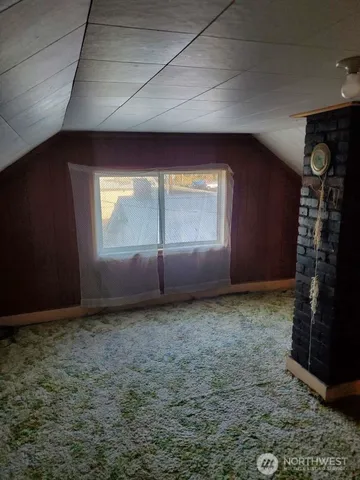 a view of a livingroom with a fireplace