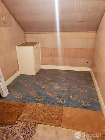 a view of a room with an empty space