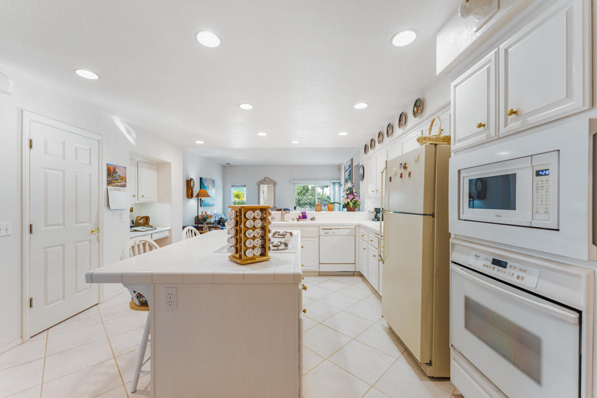 5019 Whitney Court Santa Barbara, CA 93111 - Photo 12 of 34 a view of kitchen with cabinets and refrigerator