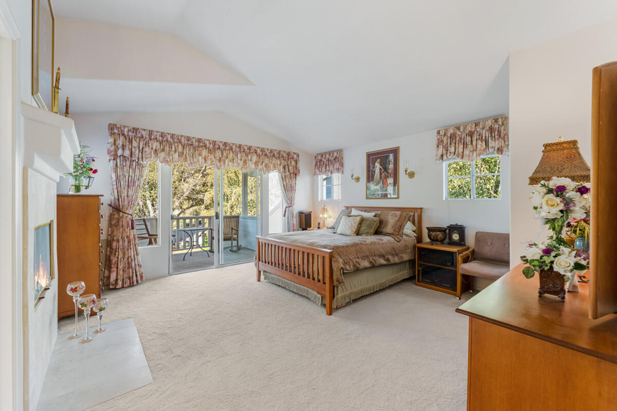 5019 Whitney Court Santa Barbara, CA 93111 - Photo 15 of 34 a spacious bedroom with a bed and a window