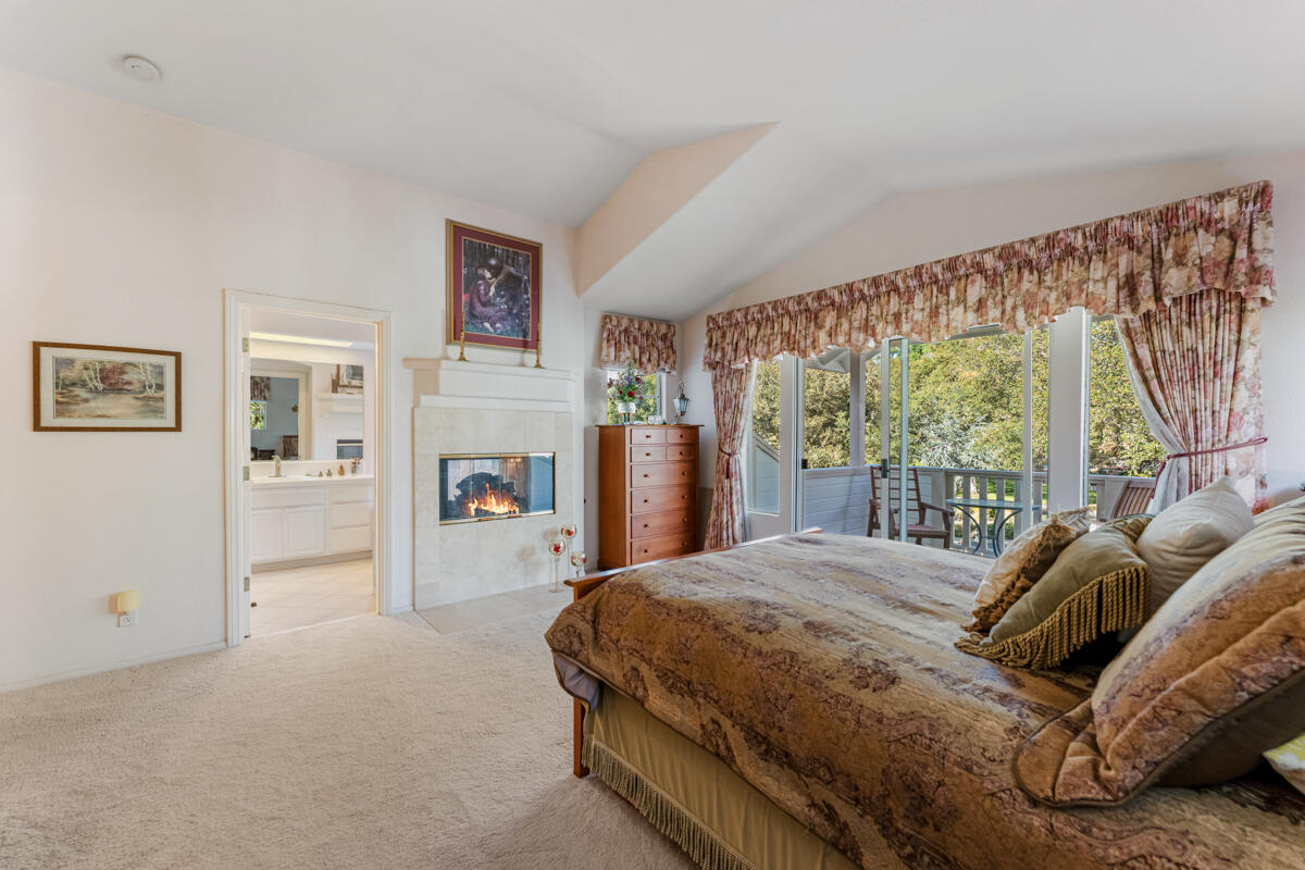 5019 Whitney Court Santa Barbara, CA 93111 - Photo 16 of 34 a bedroom with a large bed and a window