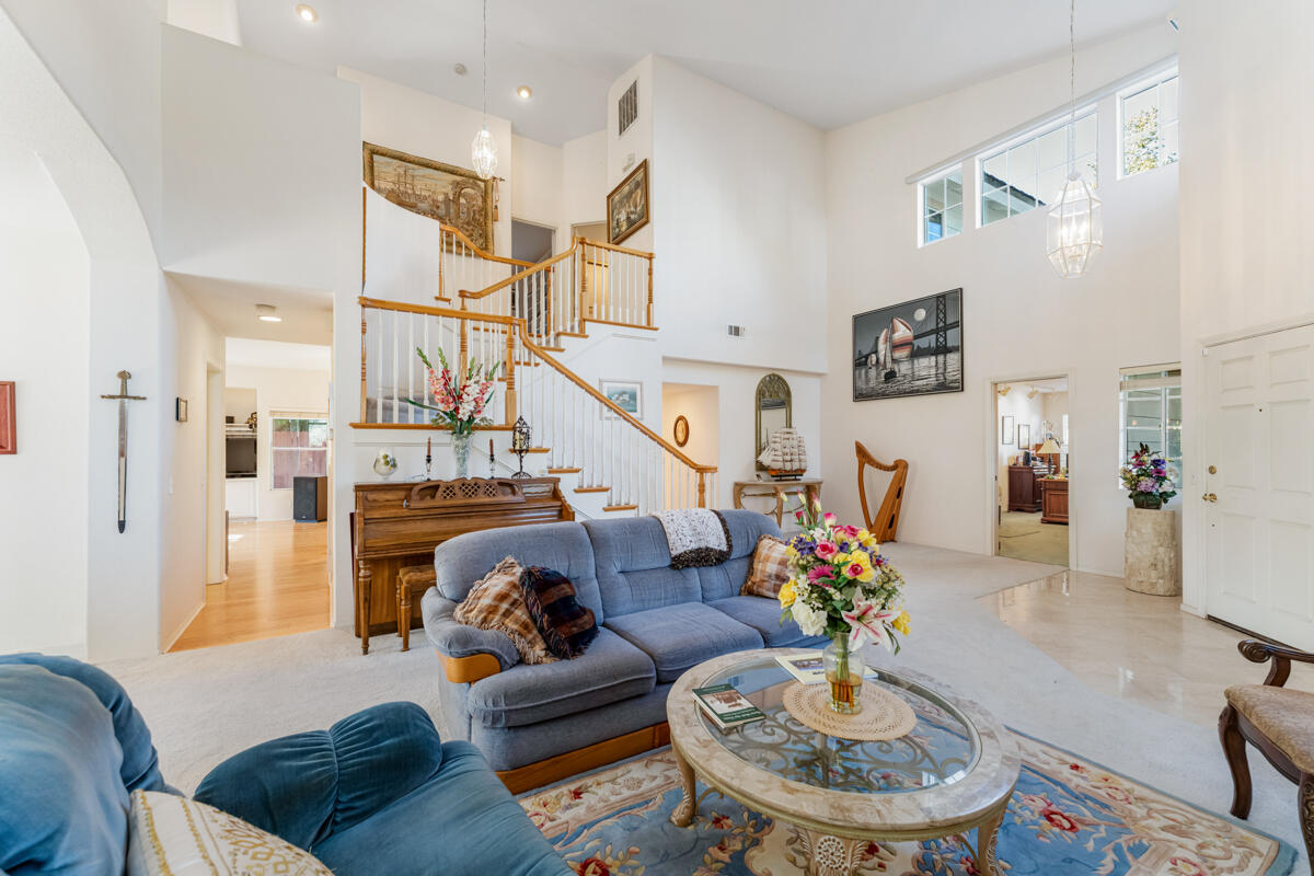 5019 Whitney Court Santa Barbara, CA 93111 - Photo 4 of 34 a living room with furniture and a dining table