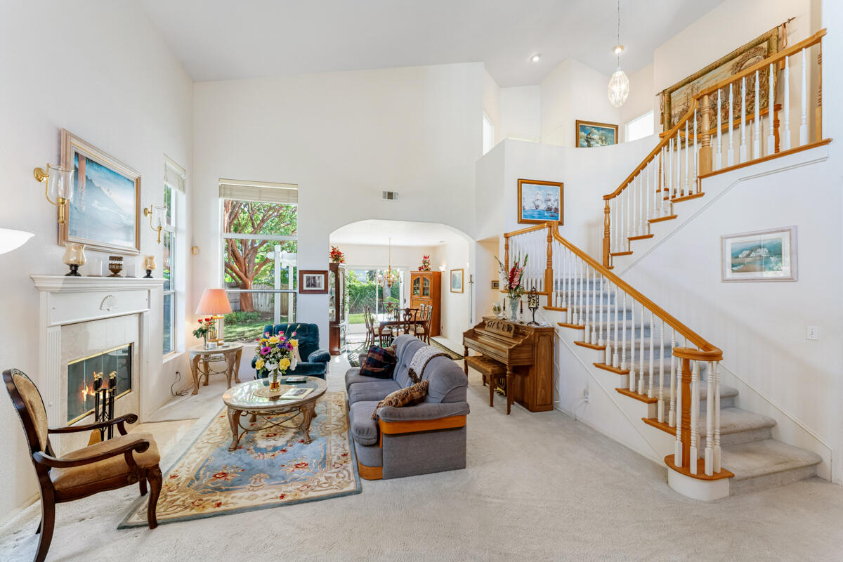 5019 Whitney Court Santa Barbara, CA 93111 - Photo 5 of 34 a living room with furniture and a fireplace