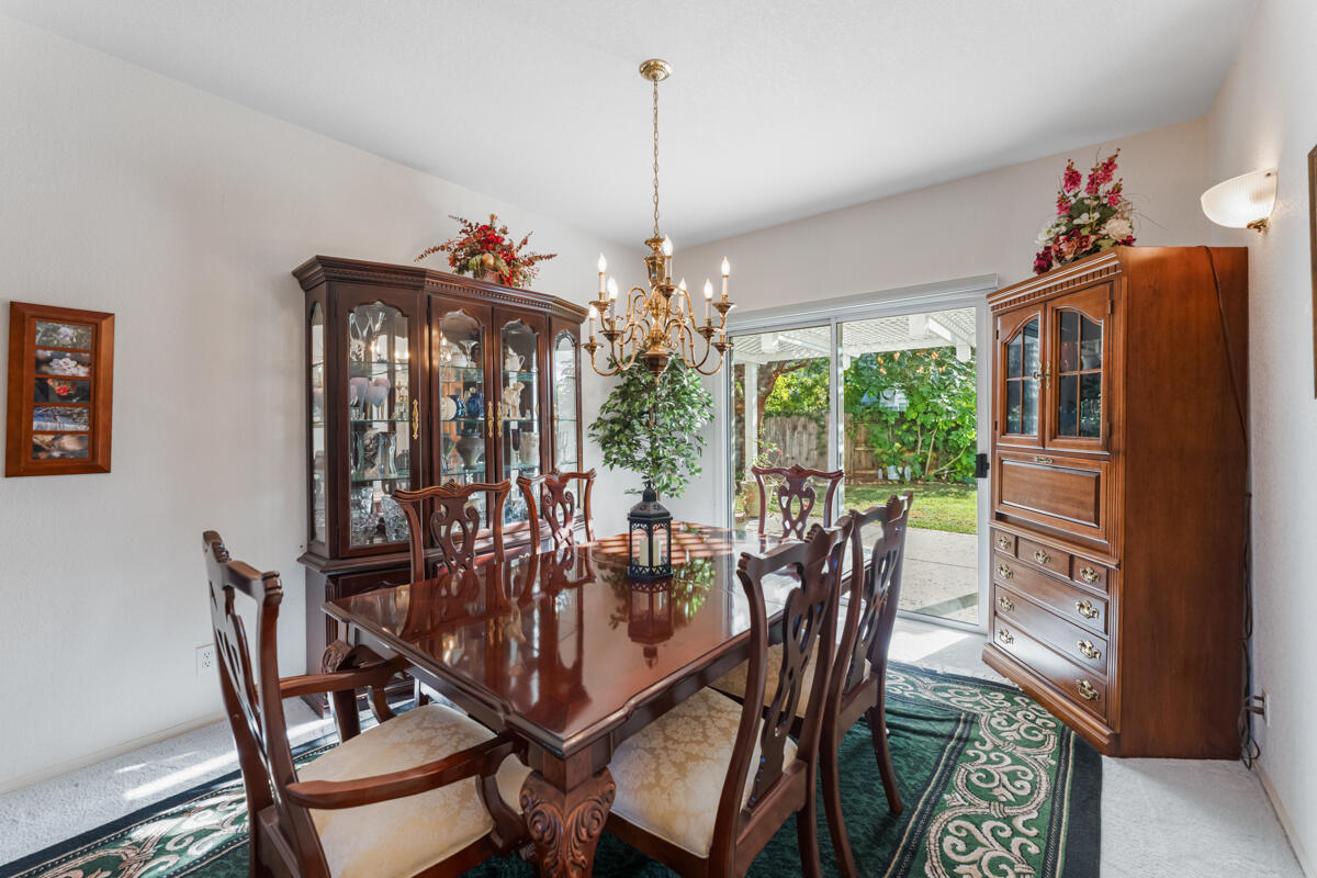 5019 Whitney Court Santa Barbara, CA 93111 - Photo 8 of 34 a view of a dining room with furniture window and wooden floor