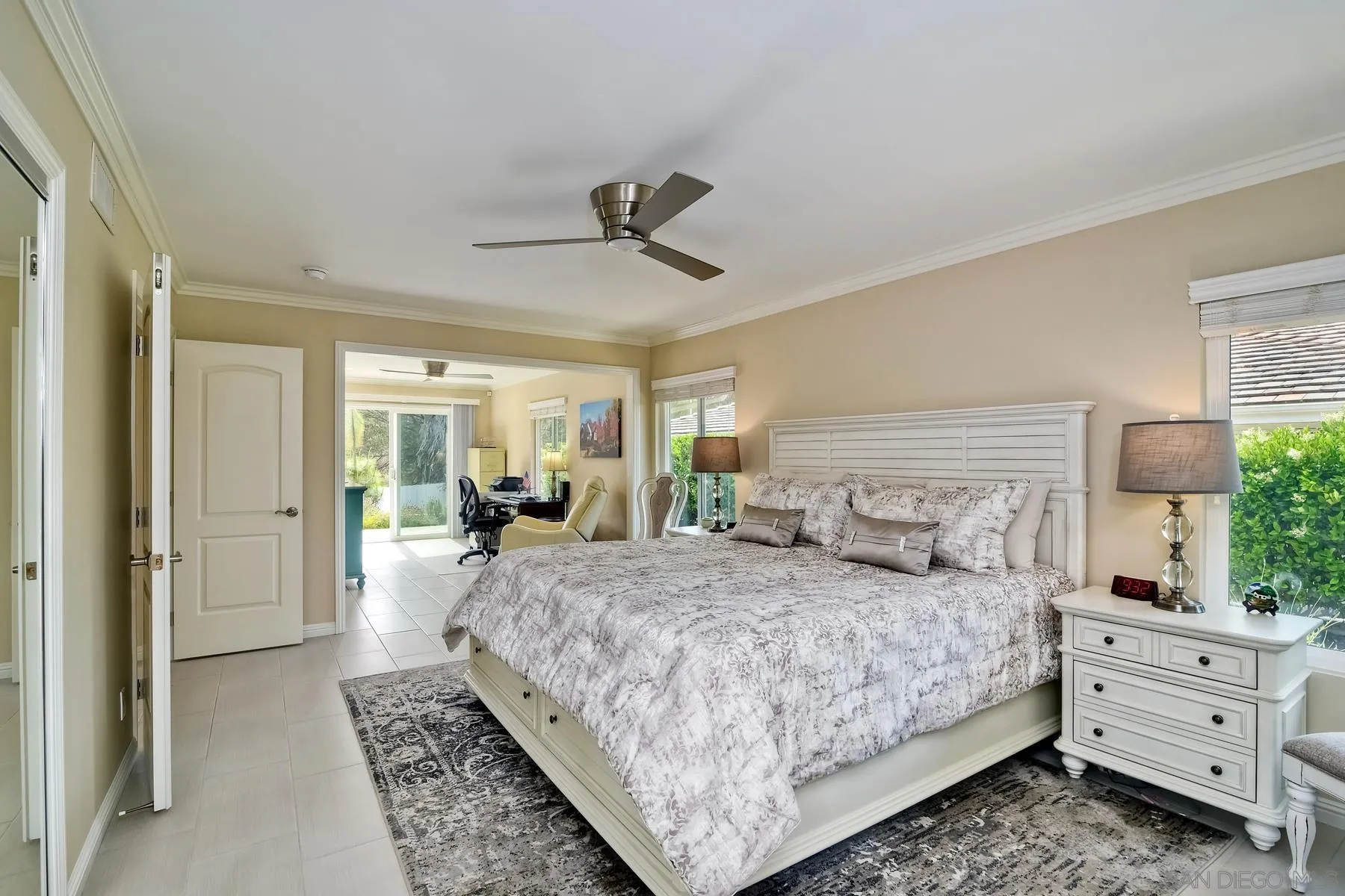 17533 St Andrews Drive Poway, CA 92064 - Photo 11 of 56 a bedroom with a large bed and windows