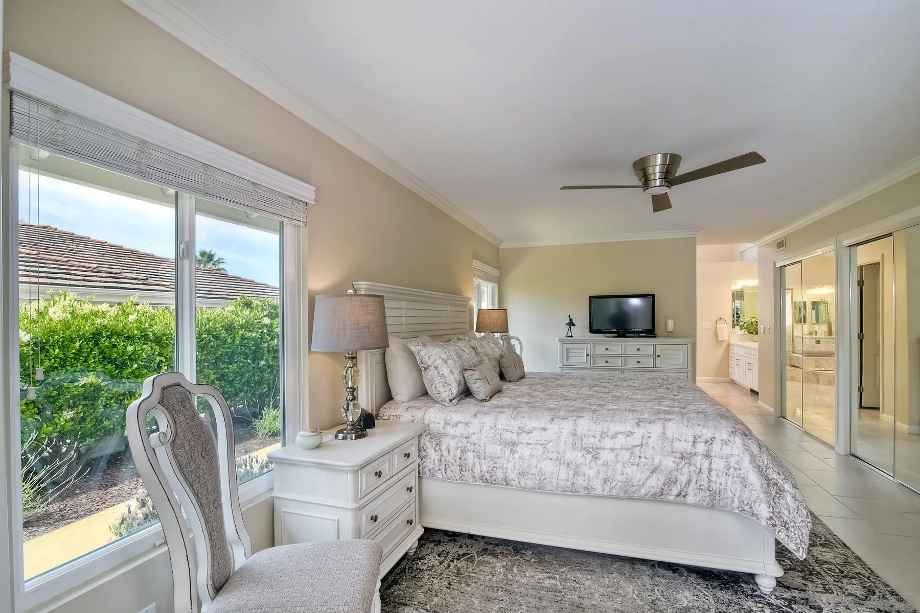 17533 St Andrews Drive Poway, CA 92064 - Photo 12 of 56 a bedroom with a large bed and a large window