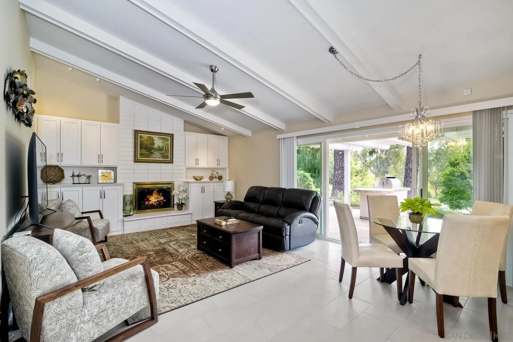 17533 St Andrews Drive Poway, CA 92064 - Photo 20 of 56 a living room with furniture fireplace and a large window