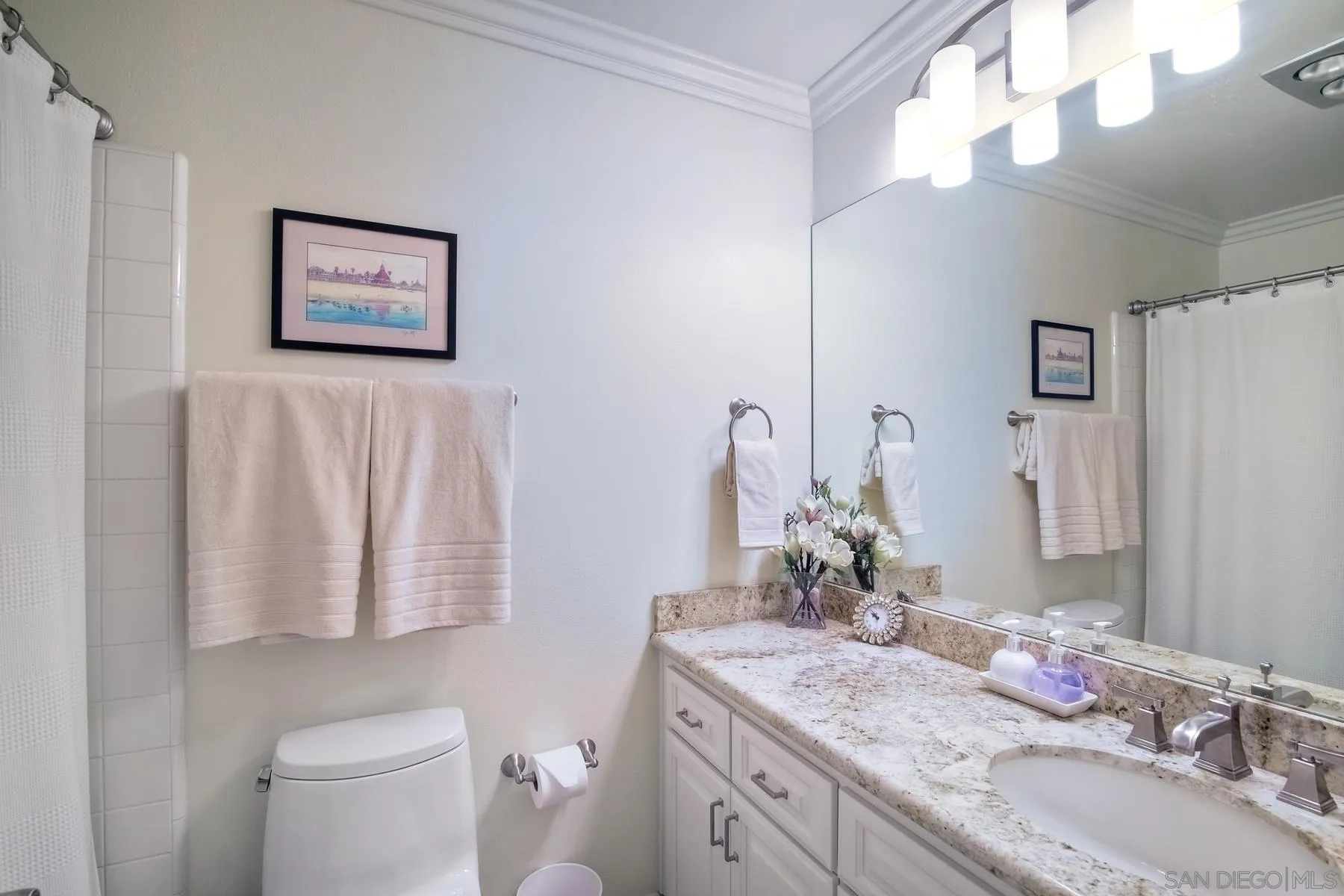 17533 St Andrews Drive Poway, CA 92064 - Photo 26 of 56 a bathroom with a granite countertop sink vanity mirror and toilet