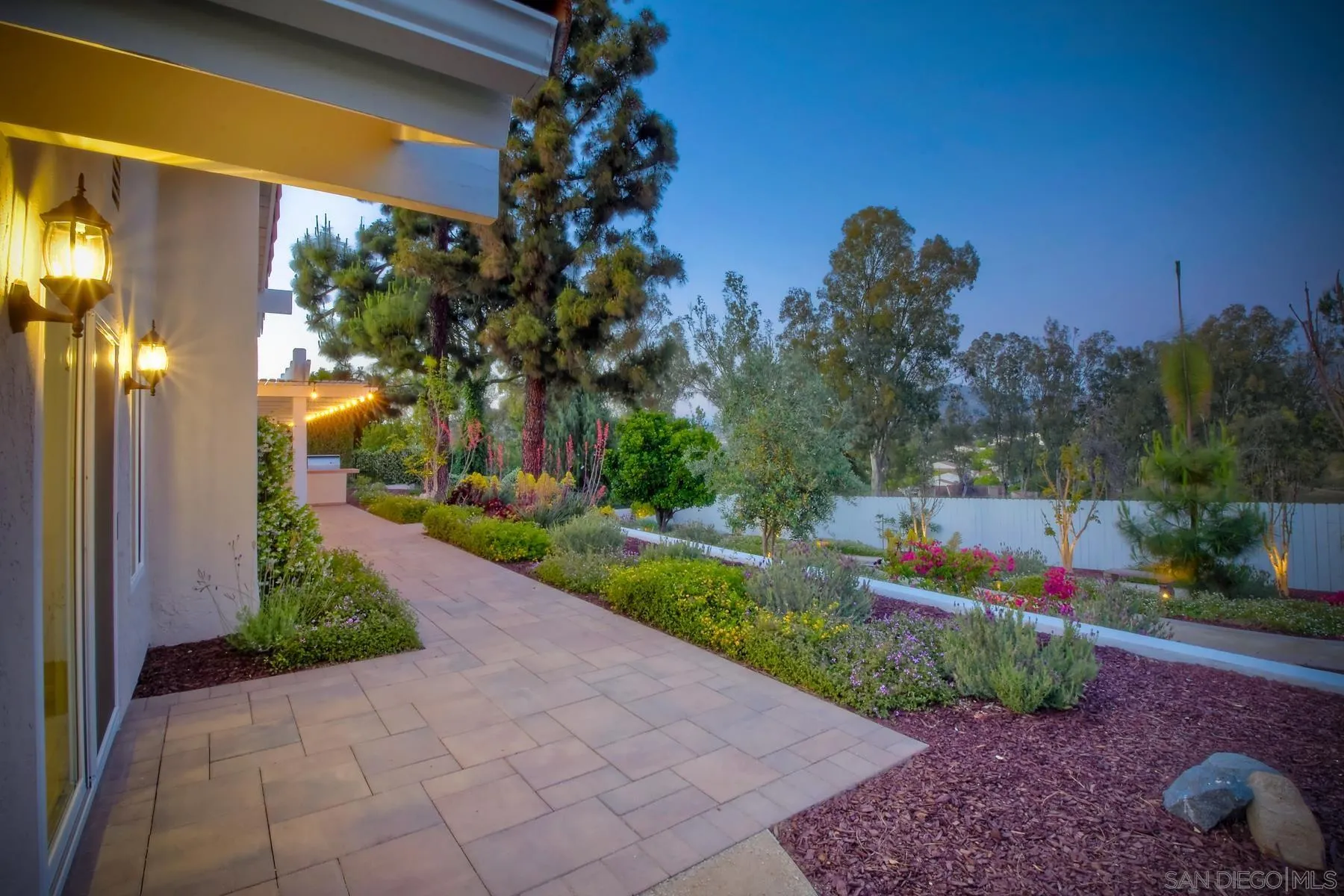 17533 St Andrews Drive Poway, CA 92064 - Photo 35 of 56 a view of flower garden in front of a house