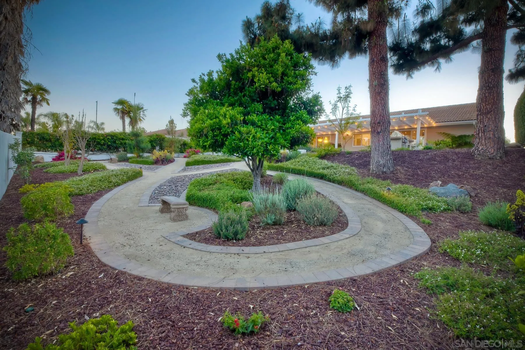 17533 St Andrews Drive Poway, CA 92064 - Photo 42 of 56 a view of a garden with a fountain