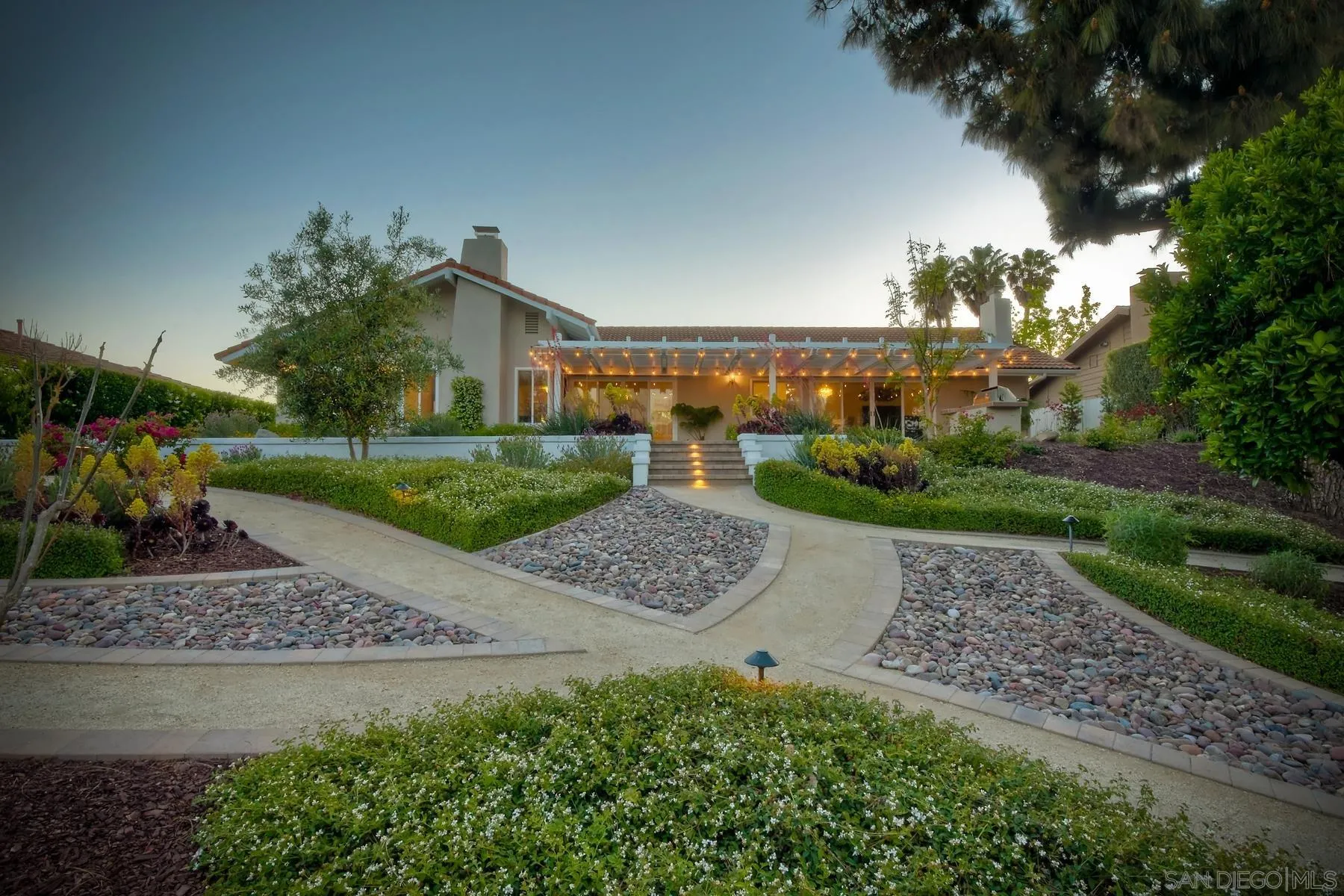 17533 St Andrews Drive Poway, CA 92064 - Photo 43 of 56 a view of a house with a yard and potted plants