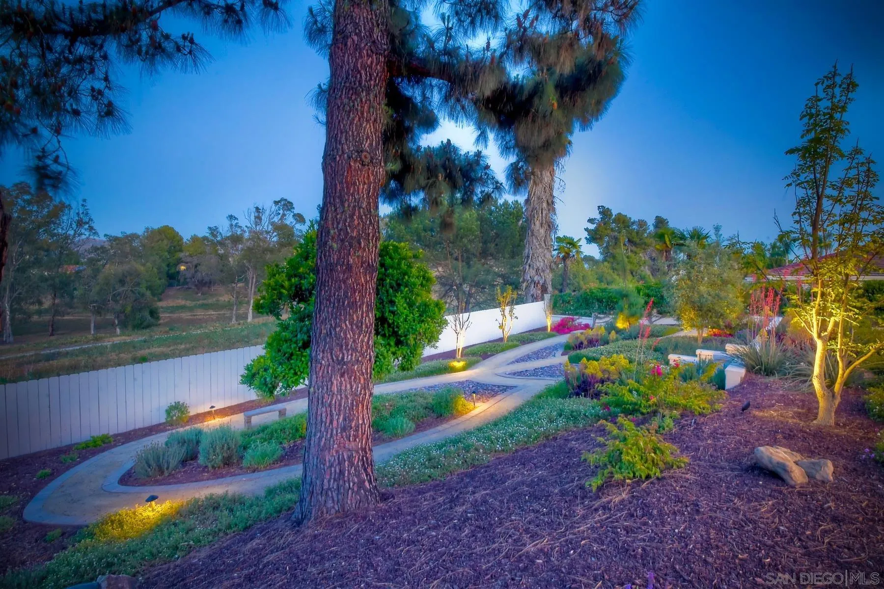 17533 St Andrews Drive Poway, CA 92064 - Photo 47 of 56 a view of a garden with a lake view