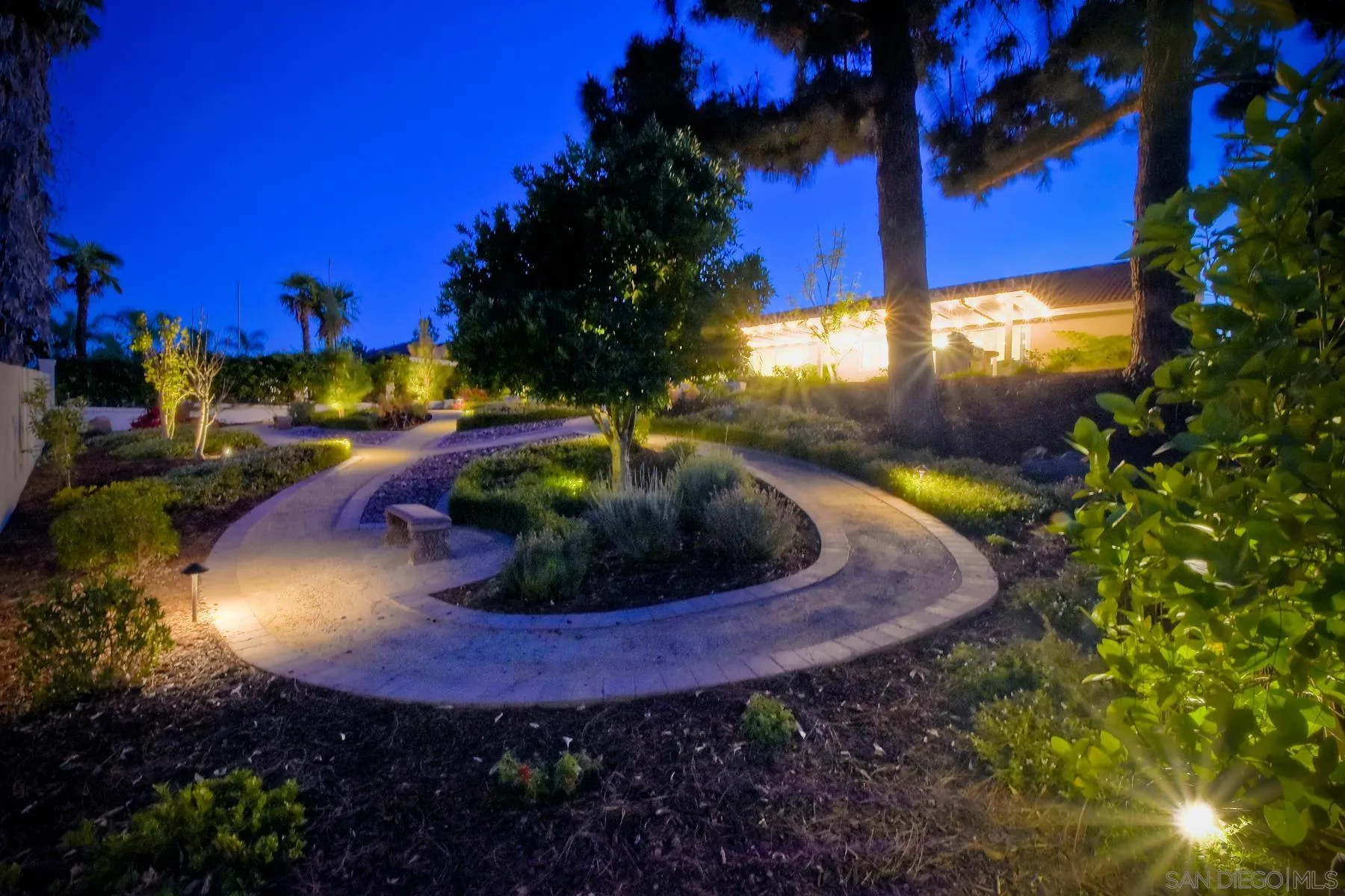 17533 St Andrews Drive Poway, CA 92064 - Photo 49 of 56 a view of a swimming pool with an outdoor space and seating area