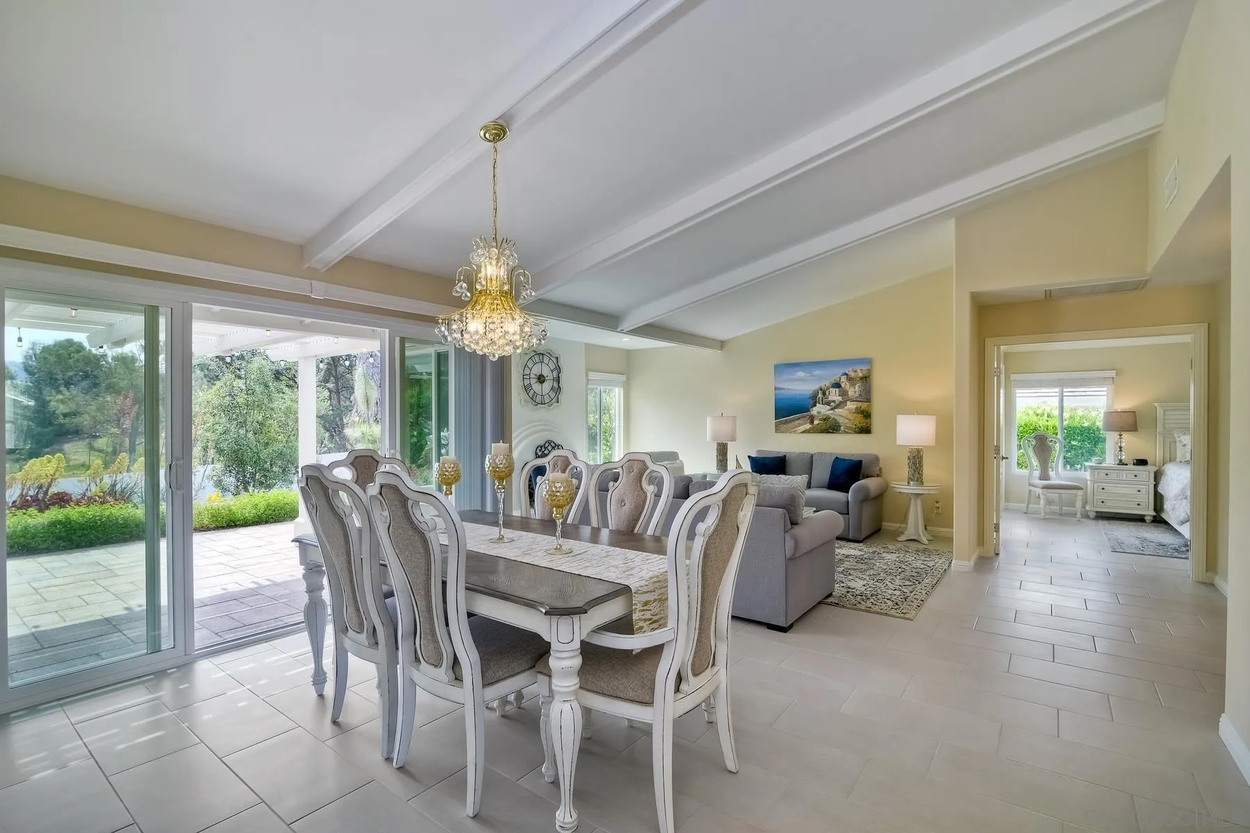 17533 St Andrews Drive Poway, CA 92064 - Photo 8 of 56 a view of a dining room with furniture wooden floor and chandelier