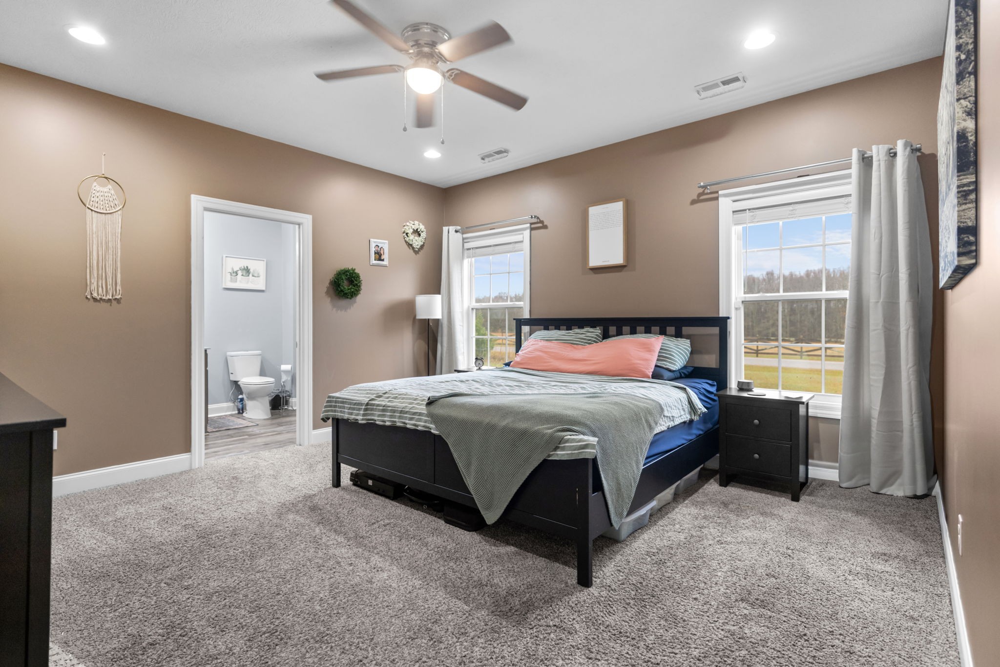 22 Hickory Drive Manchester, TN 37355 - Photo 13 of 37 a spacious bedroom with a bed and a chandelier