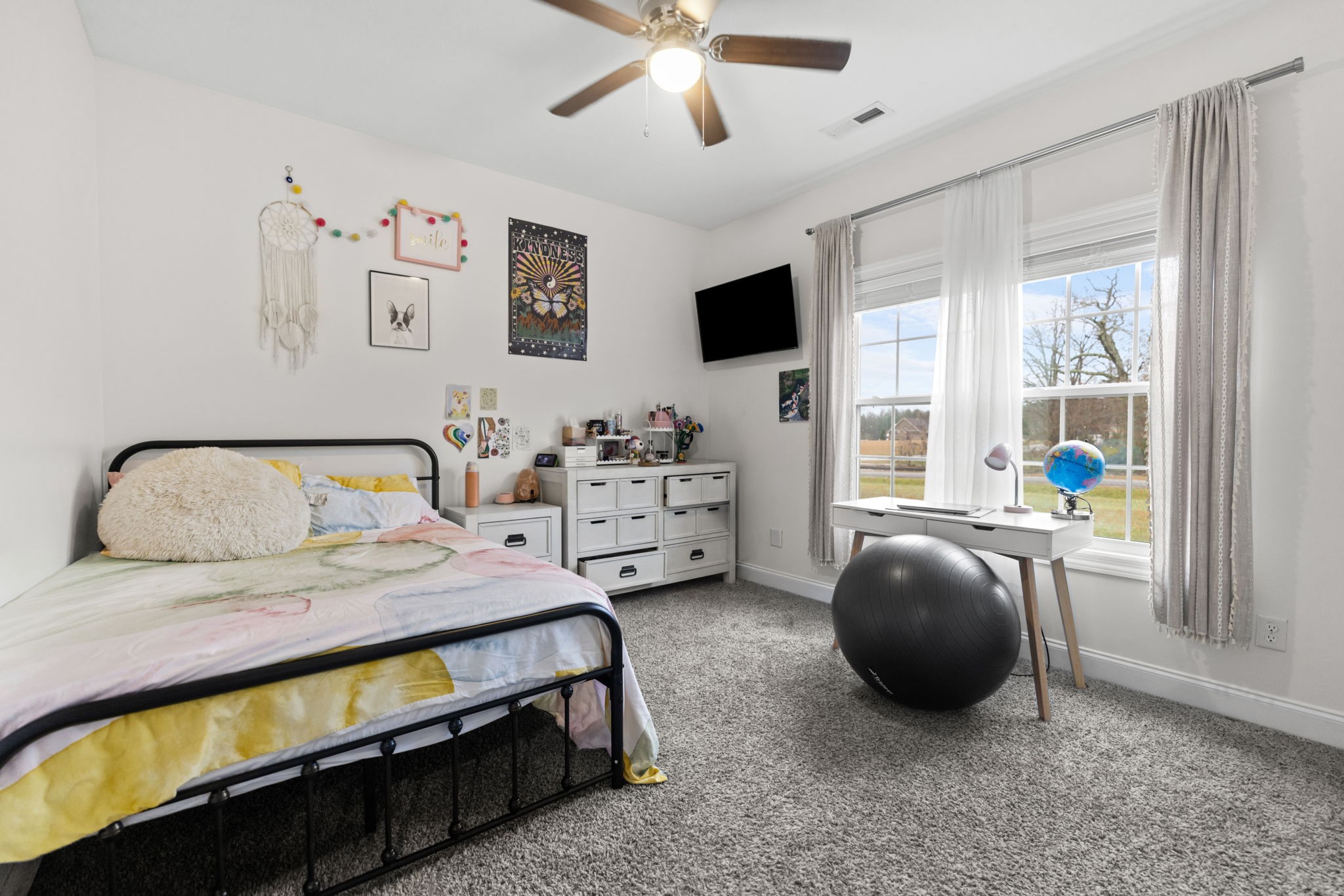 22 Hickory Drive Manchester, TN 37355 - Photo 22 of 37 a bedroom with a bed and a flat tv screen