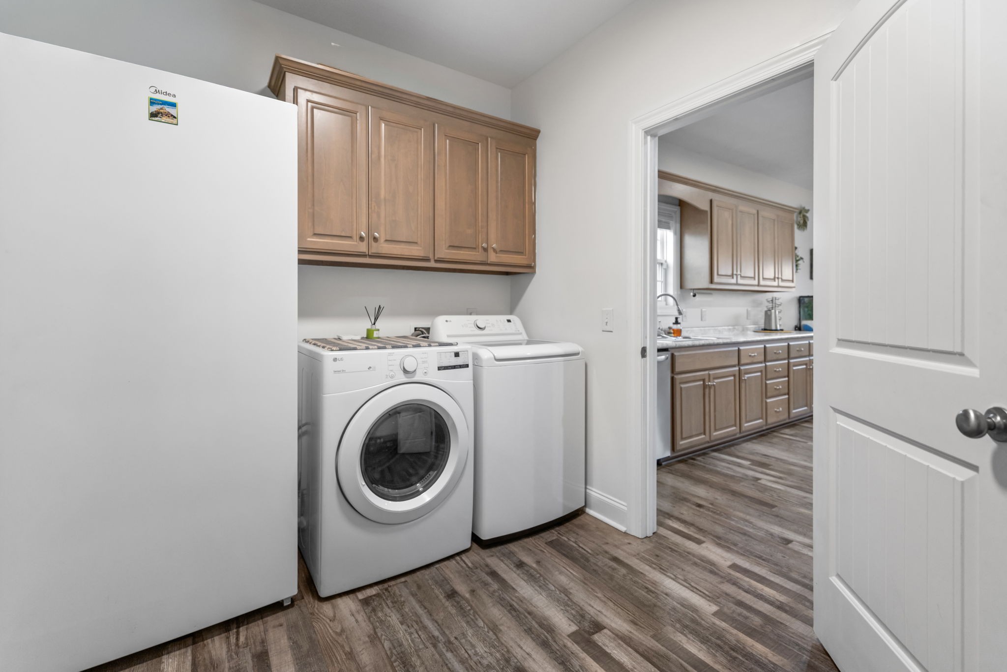 22 Hickory Drive Manchester, TN 37355 - Photo 28 of 37 a utility room with sink dryer and washer