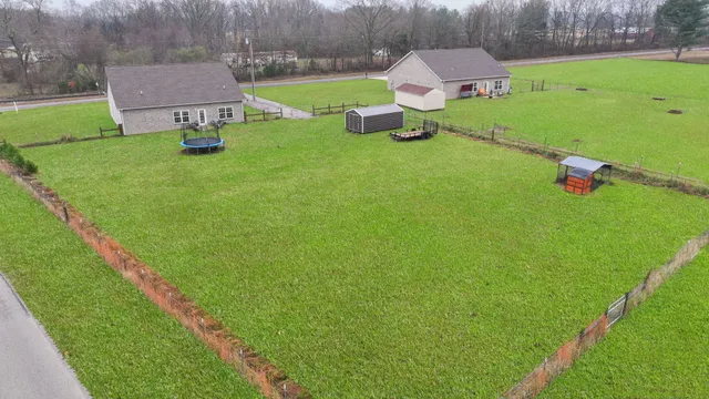 a view of a golf course with a lake