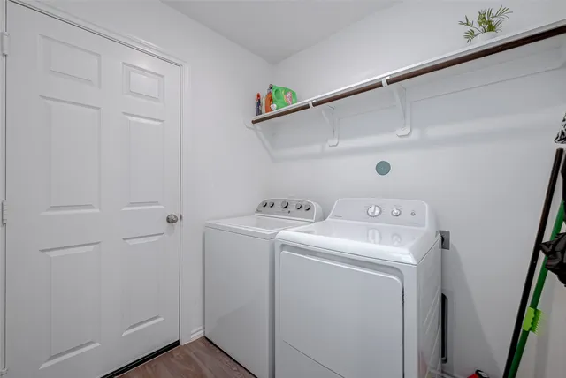 a utility room with dryer and washer