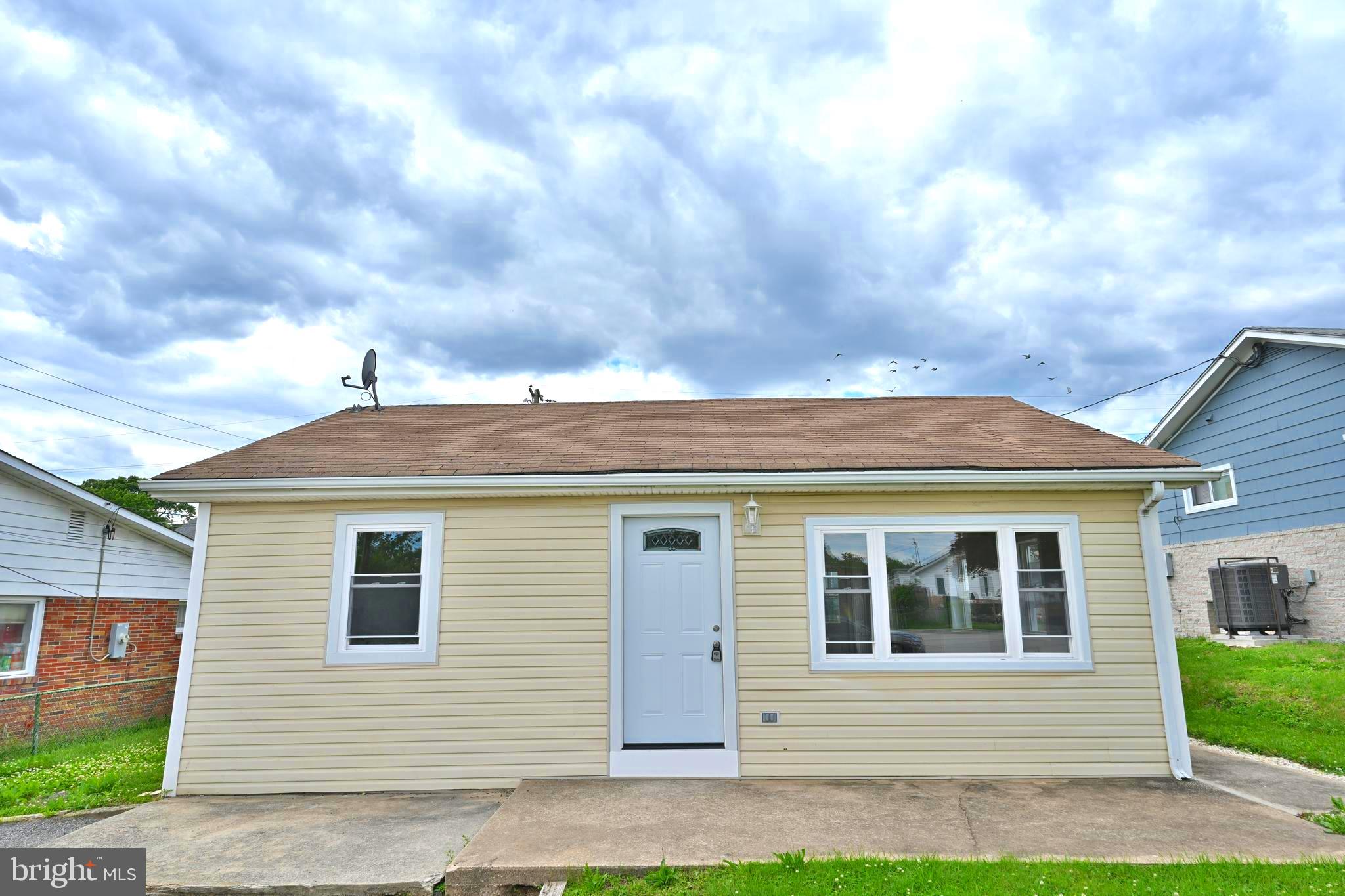 34 Compass Road East Middle River, MD 21220 - Photo 20 of 25 a view of front of house with a yard