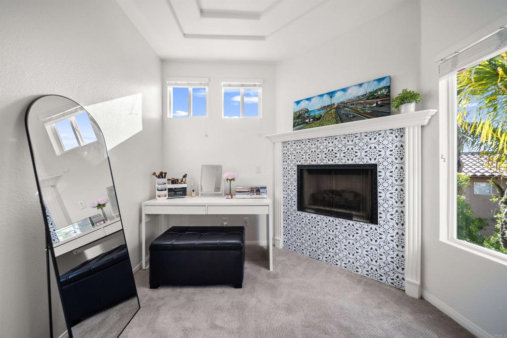 7100 Surfbird Circle Carlsbad, CA 92011 - Photo 38 of 65 a white stove top oven sitting inside of a house