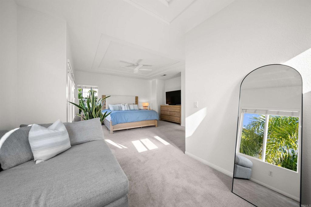 7100 Surfbird Circle Carlsbad, CA 92011 - Photo 39 of 65 a living room with furniture and a fireplace