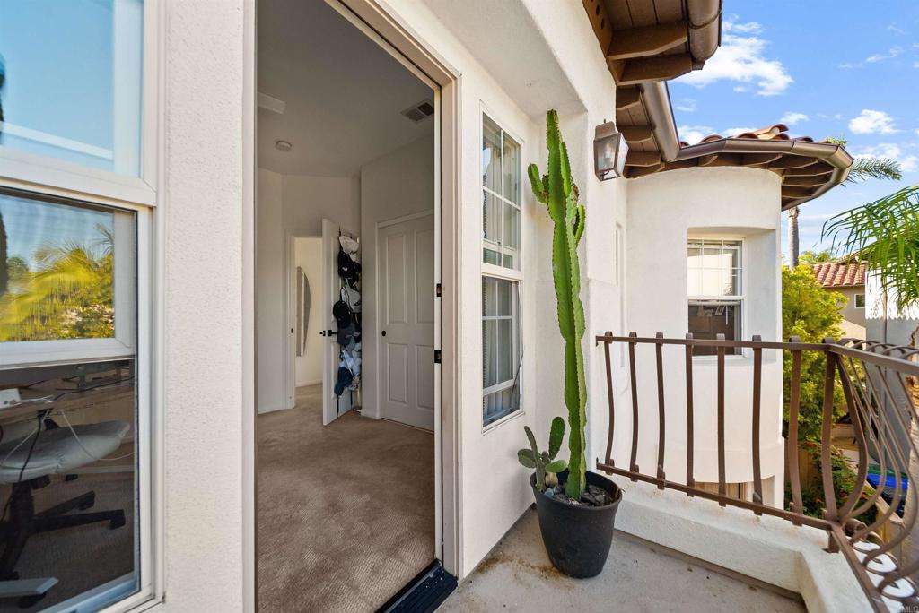 7100 Surfbird Circle Carlsbad, CA 92011 - Photo 48 of 65 a view of a house with porch