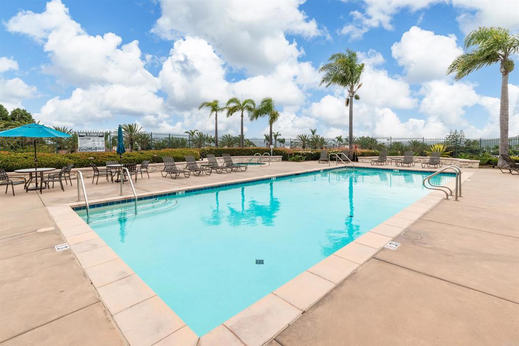 7100 Surfbird Circle Carlsbad, CA 92011 - Photo 58 of 65 a view of a swimming pool with outdoor seating