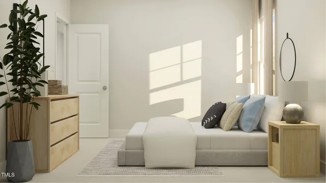 a front view of a house with a yard and potted plants