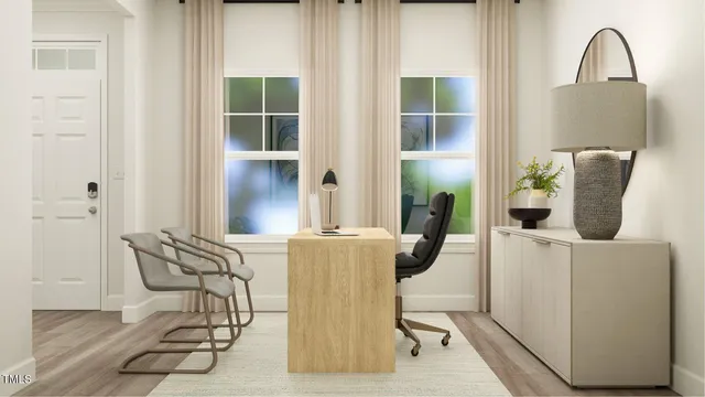 a kitchen with stainless steel appliances kitchen island granite countertop a refrigerator a stove a sink and white cabinets with wooden floor